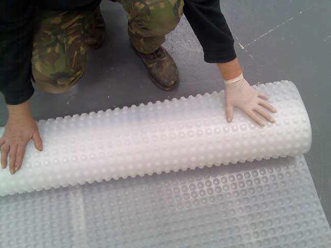 Kontract Membrane showing dimples, which are fitted downward, against the floor or wall surface.