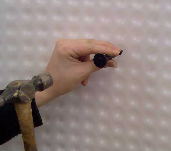 Hammer in a plug, through the Kontract Membrane